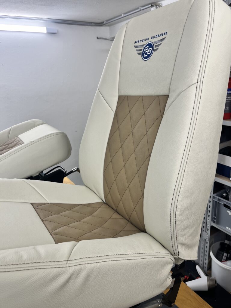 brand new leather seat with individual embroidery. Custom made design with matching colors. Creating design of aircrafts with love!