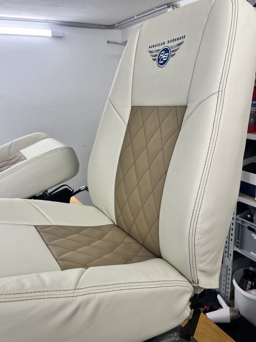 brand new leather seat with individual embroidery. Custom made design with matching colors. Creating design of aircrafts with love!